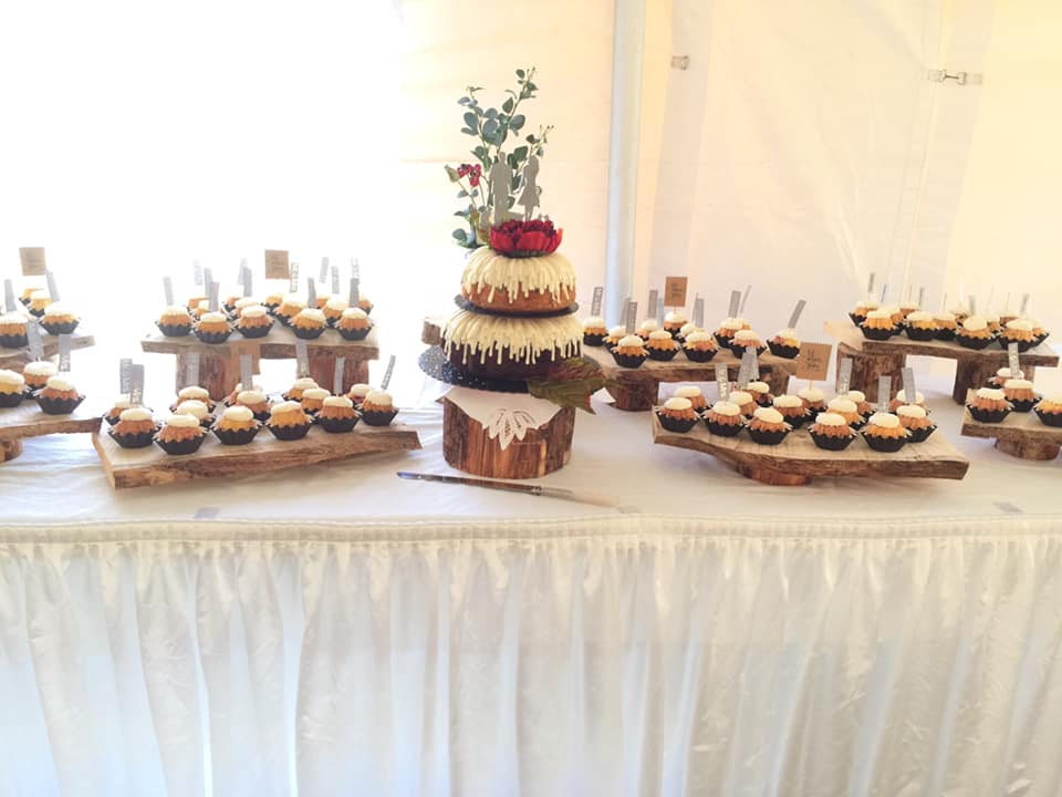 cake and cupcakes setup on table